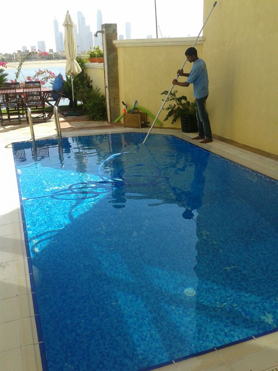 Pool cleaning staff